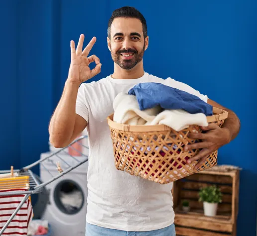 Man Giving The Okay In Laundry Room 1200X1200