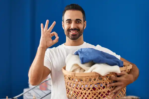 Man Giving The Okay In Laundry Room 1200X1200