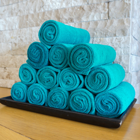 Towels Teal Colored In A Pyramid Stack 600X600