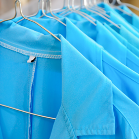 Blue Uniforms On Hangers 600X600